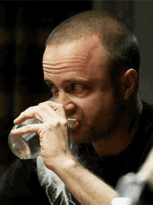 A sideways glance while drinking in Breaking Bad.