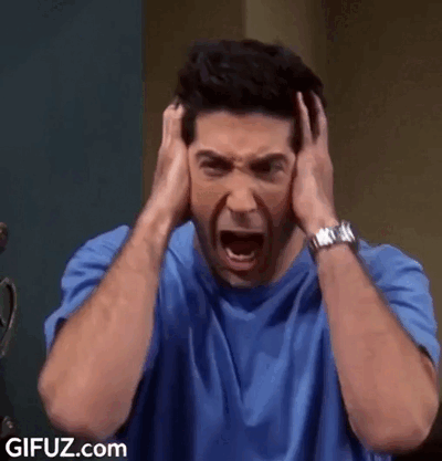 Ross loses patience and shouts with his hands on his head.
