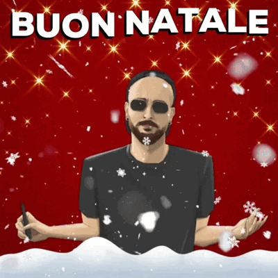 Un uomo con occhiali scuri tra fiocchi di neve e stelle dorate.