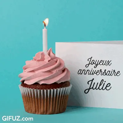 A pink cupcake with a candle accompanies a Happy Birthday Julie card.