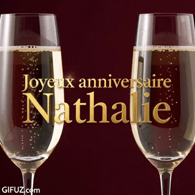 Two champagne flutes frame a Happy Birthday Nathalie message in golden letters.