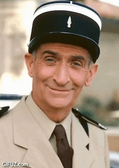 Louis de Funès applauds in a police uniform.